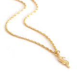 little lucky charm necklace with tiny seahorse gold charm