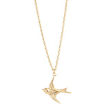 little lucky charm necklace with gold swallow charm