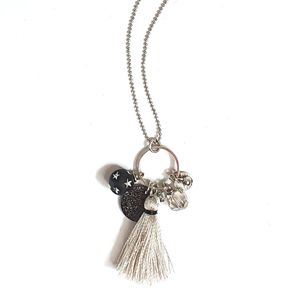 tassel necklace with grey silk tassel and silver charms