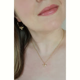 bee tiny gold charm necklace on model